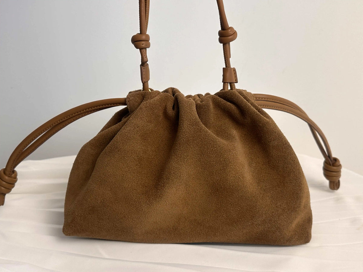 The Brezza Suede Pouch Bag