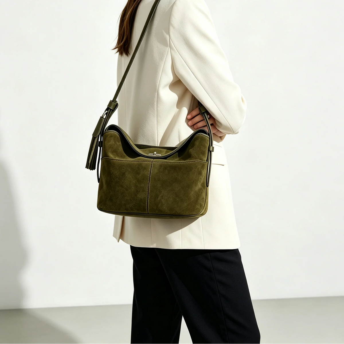 The Cesta Suede Bucket Bag