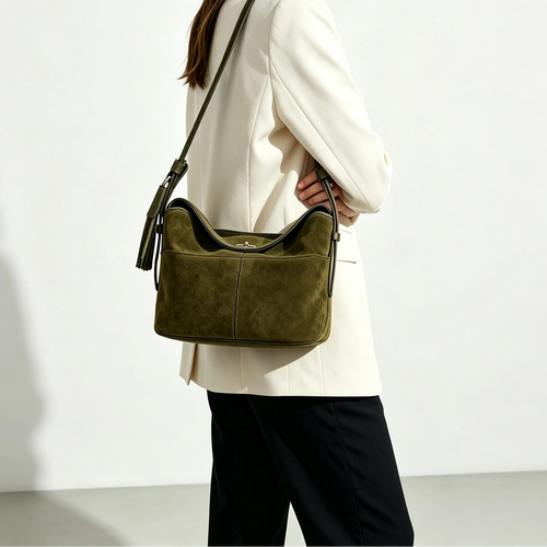 The Cesta Suede Bucket Bag