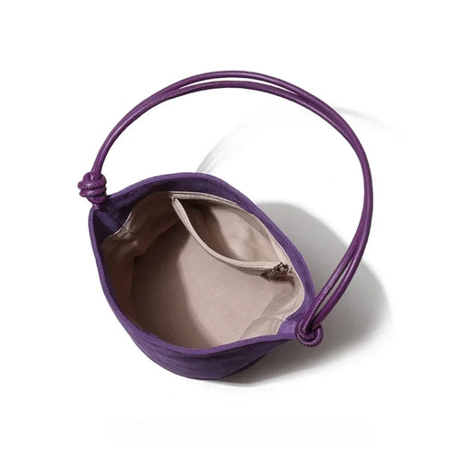 The Lanterna Suede Bucket Bag