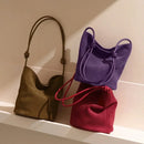 The Lanterna Suede Bucket Bag