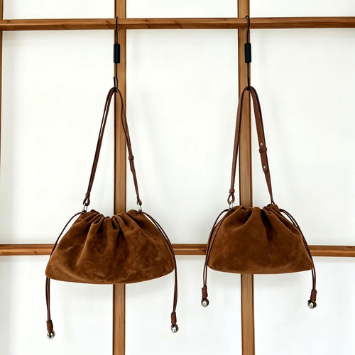 The Sacchetto Suede Drawstring Bag