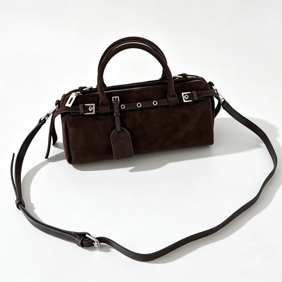 The Cilindro Suede Bowling Bag