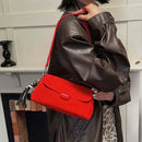 The Fiocco Suede Flap Bag
