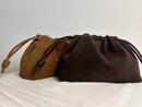 The Brezza Suede Pouch Bag