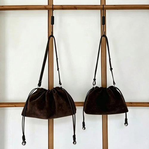 The Sacchetto Suede Drawstring Bag