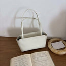 The Avorio Sheepskin Top Handle