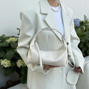 The Conchiglia Leather Crescent Bag