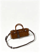 The Cilindro Suede Bowling Bag