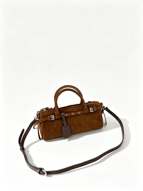 The Cilindro Suede Bowling Bag