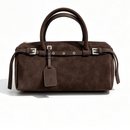 The Cilindro Suede Bowling Bag