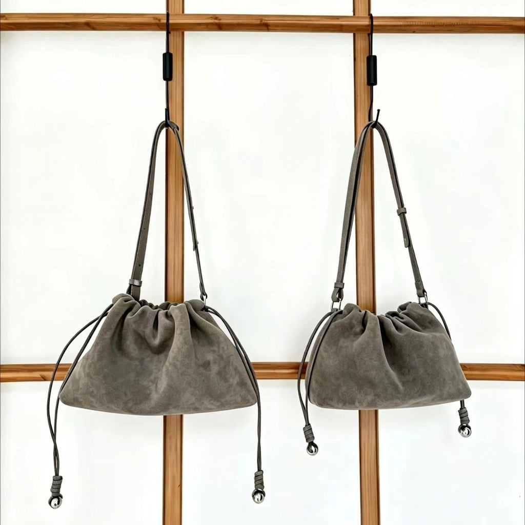 The Sacchetto Suede Drawstring Bag