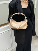 The Conchiglia Leather Crescent Bag