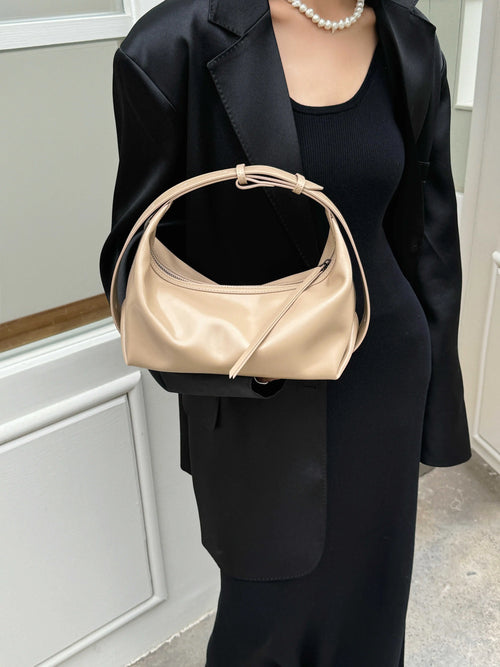 The Conchiglia Leather Crescent Bag