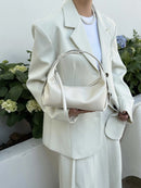 The Conchiglia Leather Crescent Bag