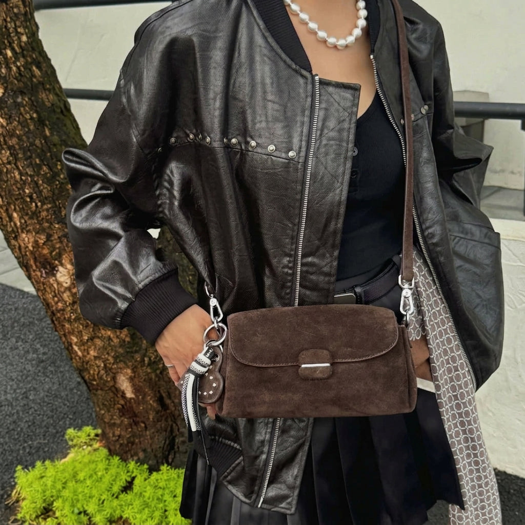 The Fiocco Suede Flap Bag