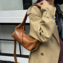 The Conchiglia Leather Crescent Bag