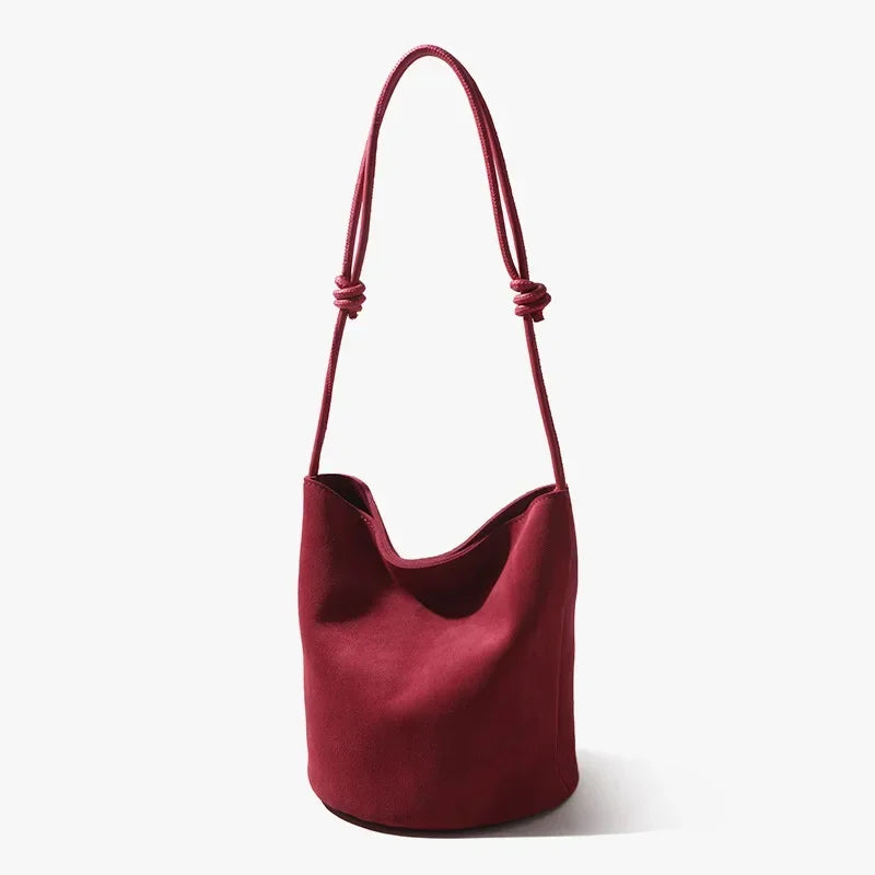 The Lanterna Suede Bucket Bag