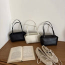 The Avorio Sheepskin Top Handle
