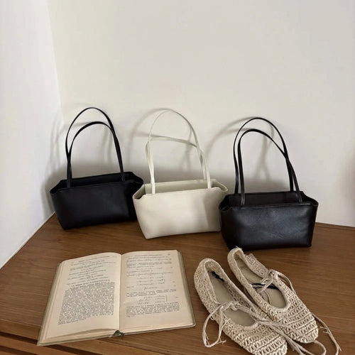 The Avorio Sheepskin Top Handle