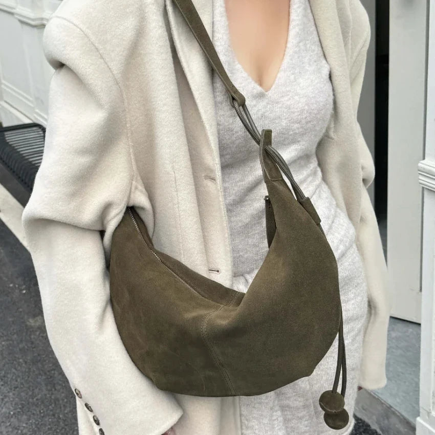 The Mezzaluna Suede Crossbody