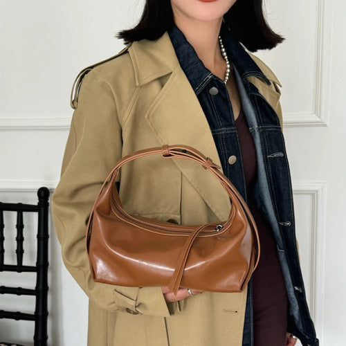 The Conchiglia Leather Crescent Bag