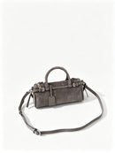 The Cilindro Suede Bowling Bag
