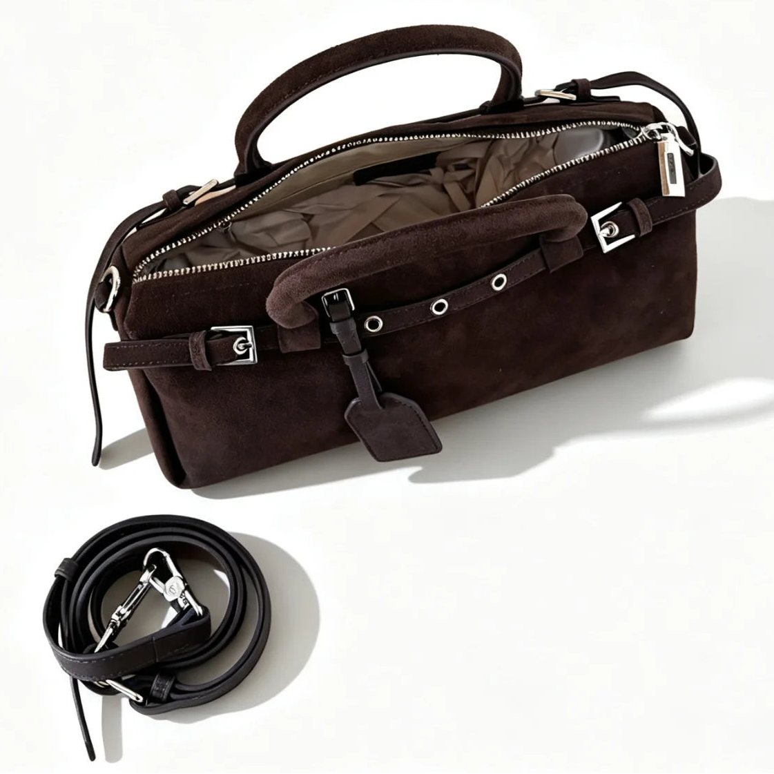 The Cilindro Suede Bowling Bag
