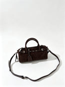 The Cilindro Suede Bowling Bag