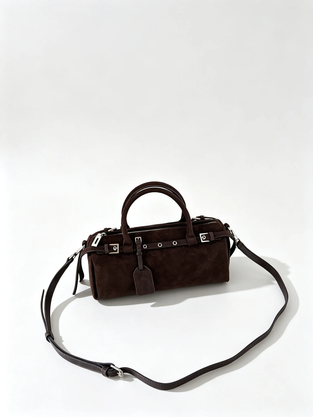 The Cilindro Suede Bowling Bag