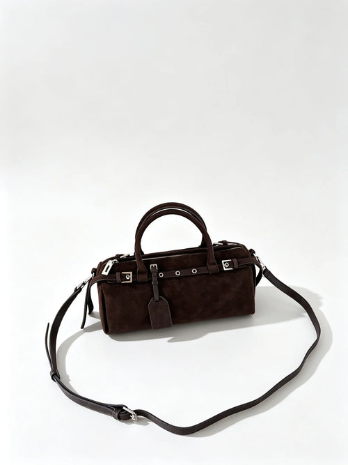 The Cilindro Suede Bowling Bag