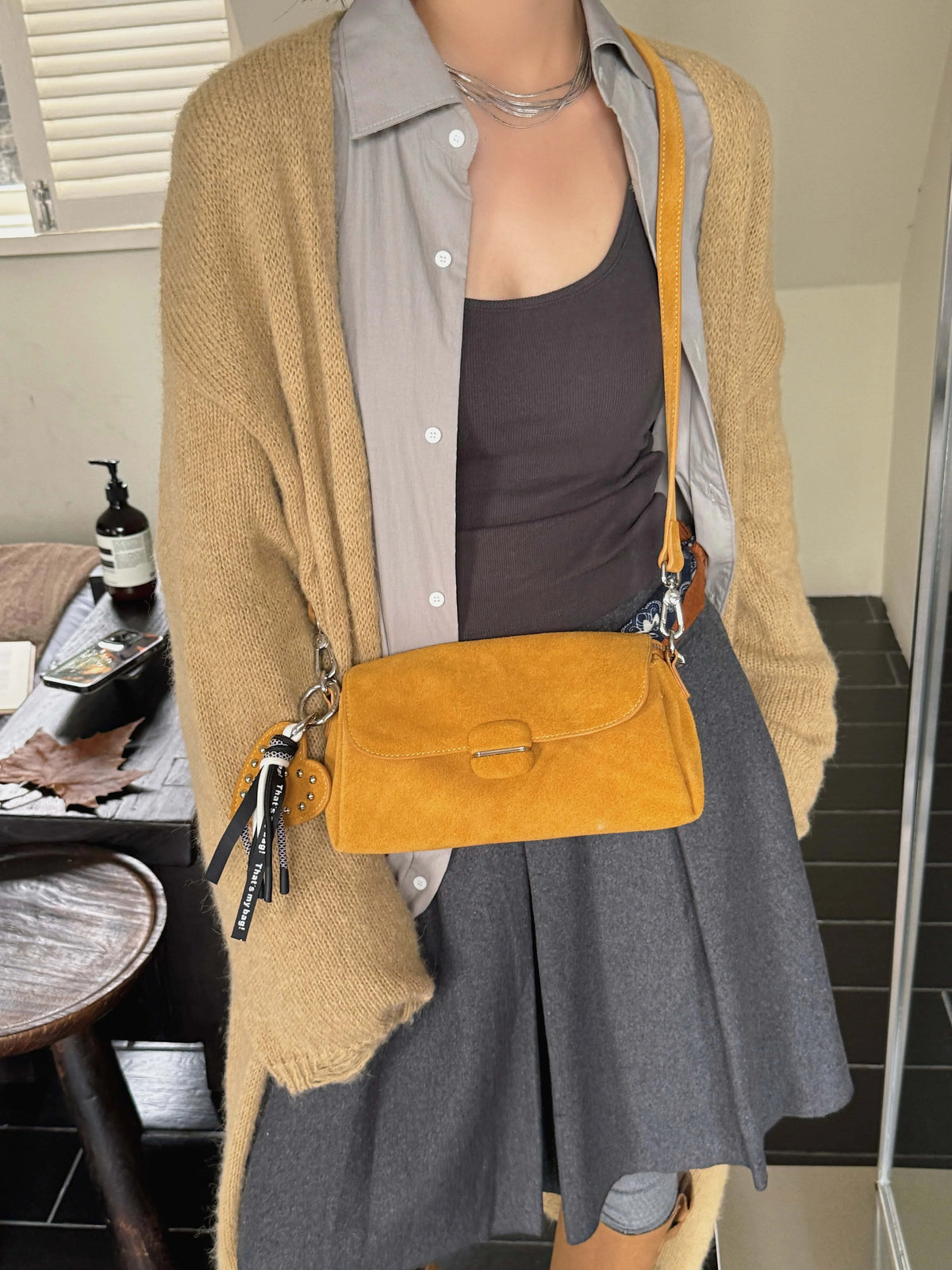 The Fiocco Suede Flap Bag