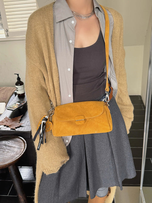 The Fiocco Suede Flap Bag
