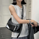 The Conchiglia Leather Crescent Bag
