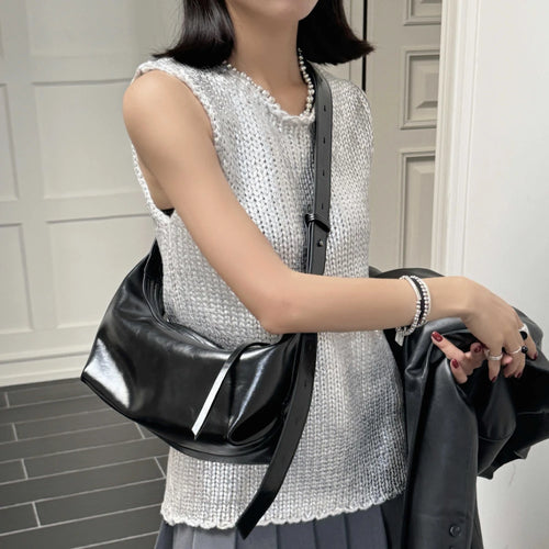 The Conchiglia Leather Crescent Bag
