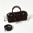 The Cilindro Suede Bowling Bag